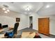 Finished basement office with desk, chair, rug, and recessed lights at 1170 Spring Oak Way, Cumming, GA 30041