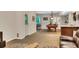Open basement living area with tile floors, a billiards table, and comfortable seating at 1170 Spring Oak Way, Cumming, GA 30041
