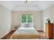 Bright bedroom with hardwood floors and ample natural light at 1170 Spring Oak Way, Cumming, GA 30041