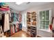 Walk-in closet with plenty of storage space and natural light at 1170 Spring Oak Way, Cumming, GA 30041