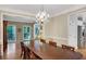 Open concept dining area with access to a bright living room and modern kitchen at 1170 Spring Oak Way, Cumming, GA 30041