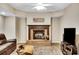 Cozy basement fireplace with brick surround, ideal for relaxation at 1170 Spring Oak Way, Cumming, GA 30041