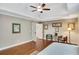 Spacious main bedroom with tray ceiling, hardwood floors, and ample natural light at 1170 Spring Oak Way, Cumming, GA 30041