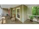 Inviting front porch with rocking chairs, offering a relaxing outdoor space at 1170 Spring Oak Way, Cumming, GA 30041