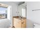 Bathroom with tile flooring and granite vanity top with city views from the doorway at 3324 Peachtree Ne Rd # 2518, Atlanta, GA 30326
