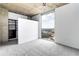 Bedroom showcasing a large window offering city views, plus a walk-in closet with storage at 3324 Peachtree Ne Rd # 2518, Atlanta, GA 30326