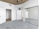 Spacious bedroom with mirrored closet doors and neutral carpet at 3324 Peachtree Ne Rd # 2518, Atlanta, GA 30326