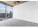 Bedroom featuring floor to ceiling windows that look out over the cityscape and neutral carpet at 3324 Peachtree Ne Rd # 2518, Atlanta, GA 30326
