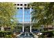 Modern high-rise with lush landscaping, water feature, and fountain at 3324 Peachtree Ne Rd # 2518, Atlanta, GA 30326