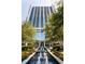 Modern high-rise with lush landscaping, water feature, and fountain at 3324 Peachtree Ne Rd # 2518, Atlanta, GA 30326