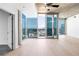 Bright and open living room with large windows and expansive city views at 3324 Peachtree Ne Rd # 2518, Atlanta, GA 30326
