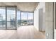Bright living room with floor to ceiling windows and city views at 3324 Peachtree Ne Rd # 2518, Atlanta, GA 30326