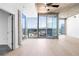 Bright and open living room with large windows and expansive city views at 3324 Peachtree Ne Rd # 2518, Atlanta, GA 30326