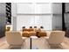 Elegant lounge featuring floor-to-ceiling windows, modular seating, and designer furnishings at 3324 Peachtree Ne Rd # 2518, Atlanta, GA 30326