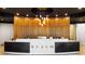 Modern reception area with custom wood paneling, pendant lighting, and sleek reception desk at 3324 Peachtree Ne Rd # 2518, Atlanta, GA 30326