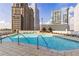 Enjoy the amazing rooftop pool with comfortable lounge seating and city views at 3324 Peachtree Ne Rd # 2518, Atlanta, GA 30326