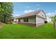 Expansive backyard featuring a well-maintained lawn and privacy fence at 430 La Perla Dr, Sugar Hill, GA 30518