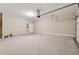 Spacious garage with high ceilings and plenty of room for parking and storage at 430 La Perla Dr, Sugar Hill, GA 30518