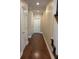 Hallway with hardwood flooring and recessed lighting at 430 La Perla Dr, Sugar Hill, GA 30518