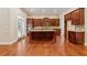 Spacious kitchen featuring stainless steel appliances and a large center island at 430 La Perla Dr, Sugar Hill, GA 30518
