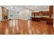 Open living area with stone fireplace and eat-in kitchen at 430 La Perla Dr, Sugar Hill, GA 30518