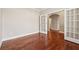 Sunlit office with hardwood floors and glass paneled french doors at 430 La Perla Dr, Sugar Hill, GA 30518