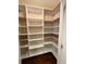 Walk-in pantry with custom shelving at 430 La Perla Dr, Sugar Hill, GA 30518