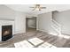Spacious living room with a fireplace and stairs to the upper level at 5667 Cascade Sw Run, Atlanta, GA 30336