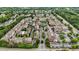 Expansive aerial view showcasing a well-planned community with townhomes and lush greenery at 2291 Falmouth Se Ct # 23, Smyrna, GA 30080