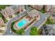 Community pool and lounge area amid well-manicured landscaping at 2291 Falmouth Se Ct # 23, Smyrna, GA 30080