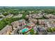 Scenic aerial view featuring a community with elegant townhomes, mature trees, and well-maintained landscaping at 2291 Falmouth Se Ct # 23, Smyrna, GA 30080