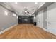 Finished basement with built-in shelving, recessed lighting, and a neutral color palette at 2291 Falmouth Se Ct # 23, Smyrna, GA 30080