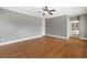 Spacious bedroom with hardwood floors, neutral paint and ceiling fan, ready for personalization at 2291 Falmouth Se Ct # 23, Smyrna, GA 30080