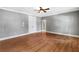 Bedroom featuring hardwood floors, neutral walls and ceiling fan at 2291 Falmouth Se Ct # 23, Smyrna, GA 30080