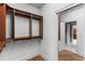 Large closet with wooden shelves and bars provides ample storage space at 2291 Falmouth Se Ct # 23, Smyrna, GA 30080
