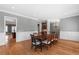 Formal dining room featuring hardwood floors, wainscoting, and stylish chandelier at 2291 Falmouth Se Ct # 23, Smyrna, GA 30080