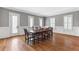 Bright dining area with wood floors, neutral walls, and a view of the outdoors at 2291 Falmouth Se Ct # 23, Smyrna, GA 30080