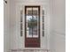 Elegant front door with sidelights and transom window, providing a warm welcome at 2291 Falmouth Se Ct # 23, Smyrna, GA 30080