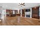 Spacious living room with fireplace, built-in bookshelves, and hardwood floors at 2291 Falmouth Se Ct # 23, Smyrna, GA 30080