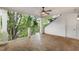 Covered outdoor porch features tile flooring, columns, and a ceiling fan at 2291 Falmouth Se Ct # 23, Smyrna, GA 30080