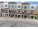 Well-maintained townhouse complex with garages, balconies, and designer landscaping at 2327 Mason Dr # D23, Atlanta, GA 30316