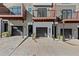 Modern townhouse exteriors with balconies and garages and designer landscaping at 2327 Mason Dr # D23, Atlanta, GA 30316