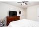 Spacious bedroom with dresser and fan at 637 Little Bear Loop, Canton, GA 30114