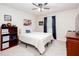 Cozy bedroom featuring a comfortable bed, dresser, and decor at 637 Little Bear Loop, Canton, GA 30114