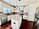 Well-equipped kitchen featuring a center island, stainless steel appliances, and granite countertops at 958 Nevis Way, Mcdonough, GA 30253