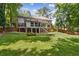 Spacious backyard with mature trees at 1835 Redbourne Dr, Atlanta, GA 30350