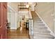 Grand foyer with hardwood floors, staircase, and views to the living room at 1835 Redbourne Dr, Atlanta, GA 30350