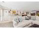 Comfortable living room with plush seating, stylish decor, and open access to other areas at 1835 Redbourne Dr, Atlanta, GA 30350
