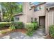 Charming townhome with well-maintained landscaping and inviting entrance creates a welcoming first impression at 301 Parkaire Xing, Marietta, GA 30068