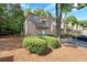 Well-maintained townhomes surrounded by mature trees, offering a serene and picturesque living environment at 301 Parkaire Xing, Marietta, GA 30068